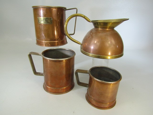 Three Copper antique grain measures and one other