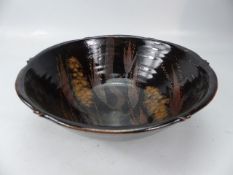 Simon Eeles a Studio Pottery bowl decorated with flora.