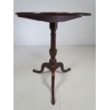 Georgian mahogany tip up table on tripod feet