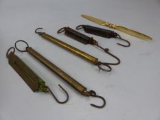 Small collection of Spring balance scales and a Gold plated propeller paper knife