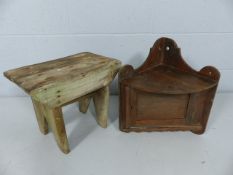 Rustic wooden stool and a small hanging cupboard