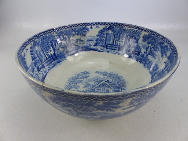 Staffordshire pearlware blue and white bowl decorated with scenes of cottages