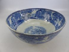 Staffordshire pearlware blue and white bowl decorated with scenes of cottages
