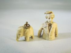 Antique ivory miniature of a suited man, along with a carved ivory pendant of an elephant