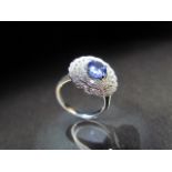 18CT white gold tanzanite and diamond cluster ring of approx 2.5cts