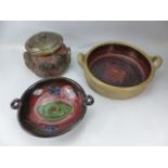 Three pieces of Studio pottery to include a lidded pot, twin handled bowl and one other