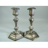 Hallmarked silver weighted candlesticks of Architectural form. Hallmarked London 1905, Thomas