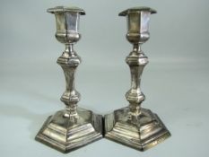 Hallmarked silver weighted candlesticks of Architectural form. Hallmarked London 1905, Thomas