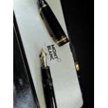 A Mont Blanc Meisterstuck No.149 fountain pen, black resin with gold plated mounts, with 23.5ct