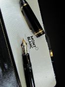 A Mont Blanc Meisterstuck No.149 fountain pen, black resin with gold plated mounts, with 23.5ct