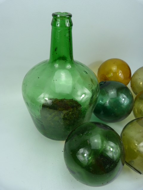 Green glass mallet bottle and a selection of glass buoys - Image 4 of 4