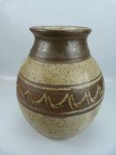 Branscombe Pottery globular vase decorated in Earthen ware colours designed by Eric Golding.