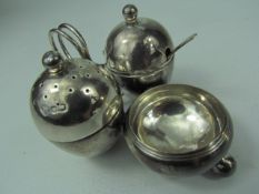 Unusual Hallmarked silver condiment set in the form of two acorns and a front bowl. Joined by a loop