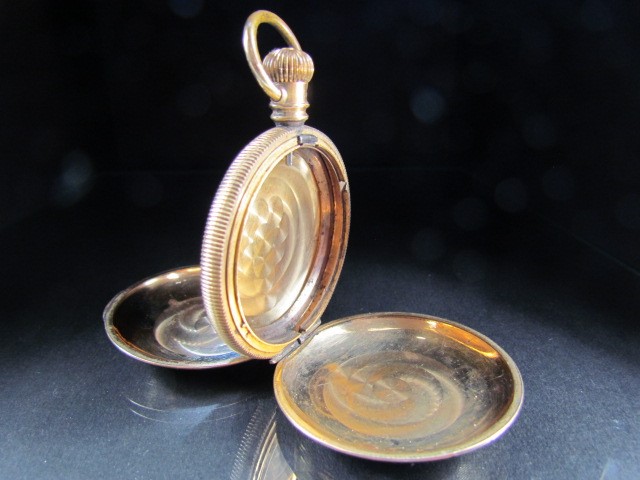 Gold Plated full hunter pocket watch case with engine turned decoration.