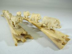 Oriental bone carvings - depicting four tiger's crossing a bridge and the other of four Boar