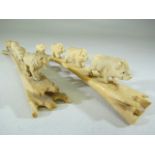 Oriental bone carvings - depicting four tiger's crossing a bridge and the other of four Boar