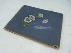 Autograph album containing hand drawn pictures