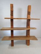 Hardwood shelving unit in a pyramid design