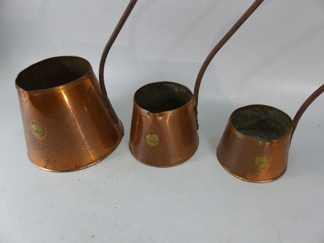 Three Graduating Copper cider measures all stamped with brass plate 'Cider' - Image 3 of 4
