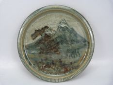 David Eeles studio pottery charger decorated with a mountainous scene