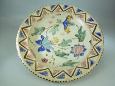 Honiton Pottery Charger decorated with Flora and marked J.B to base.