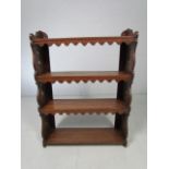 Small Oak bookcase with decorated frieze