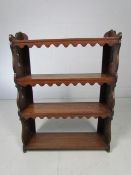 Small Oak bookcase with decorated frieze