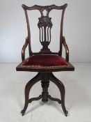 Unusual Rosewood Art Nouveau ladies swivel desk chair with open fretwork back and upholstered