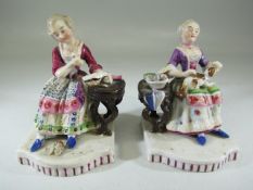 Fairings - a pair of staffordshire seated figures