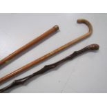 Three vintage walking sticks