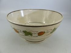 Pearlware 19th century orange bowl. Has had repairs, decorated with oranges and vine leaves.