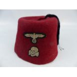 WW2 German S.S. Volunteers red dress fez uniform cap. Centre black tassels present. Bevo woven eagle