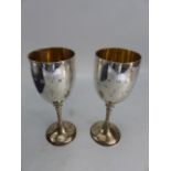 Anthony Elson for Garrard - cased pair of Goblets. Hallmarked to the bowl with Garrard hallmark.