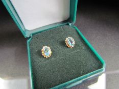 9ct pair of London Blue Topaz stone set earrings