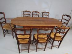 Antique Elm dining table with matching carved chairs