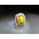 Ladies dress ring ornate gold coloured mount