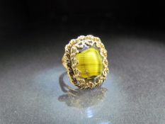 Ladies dress ring ornate gold coloured mount