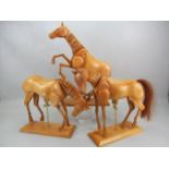 Three model artists horses