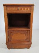 Oak Arts and Crafts cabinet with marble top inset