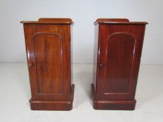 Antique mahogany bedside cupboards