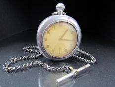 Military Trench pocket watch in trench case. Appears to be working when wound Marked with crows foot