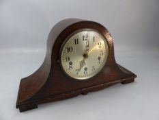 Oak cased dome topped mantle clock