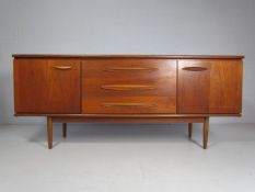 Teak Mid Century sideboard with cupboards and drawers