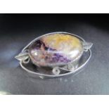 Fluorite brooch set in a silver coloured metal in an Arts and crafts style