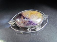 Fluorite brooch set in a silver coloured metal in an Arts and crafts style