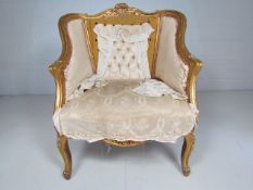 Antique french armchair in the Louis style in need of re-upholstering