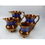 Graduated set of Victorian Copper Lustre jugs