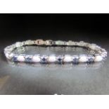 Silver Line bracelet set with Opals and Sapphire panels