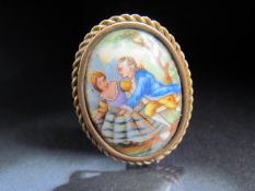 Limoges porcelain brooch mounted in Pinchbeck twist frame.