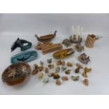 Selection of Wade Whimsies and larger Wade figures along with Poole pottery dolphin and small